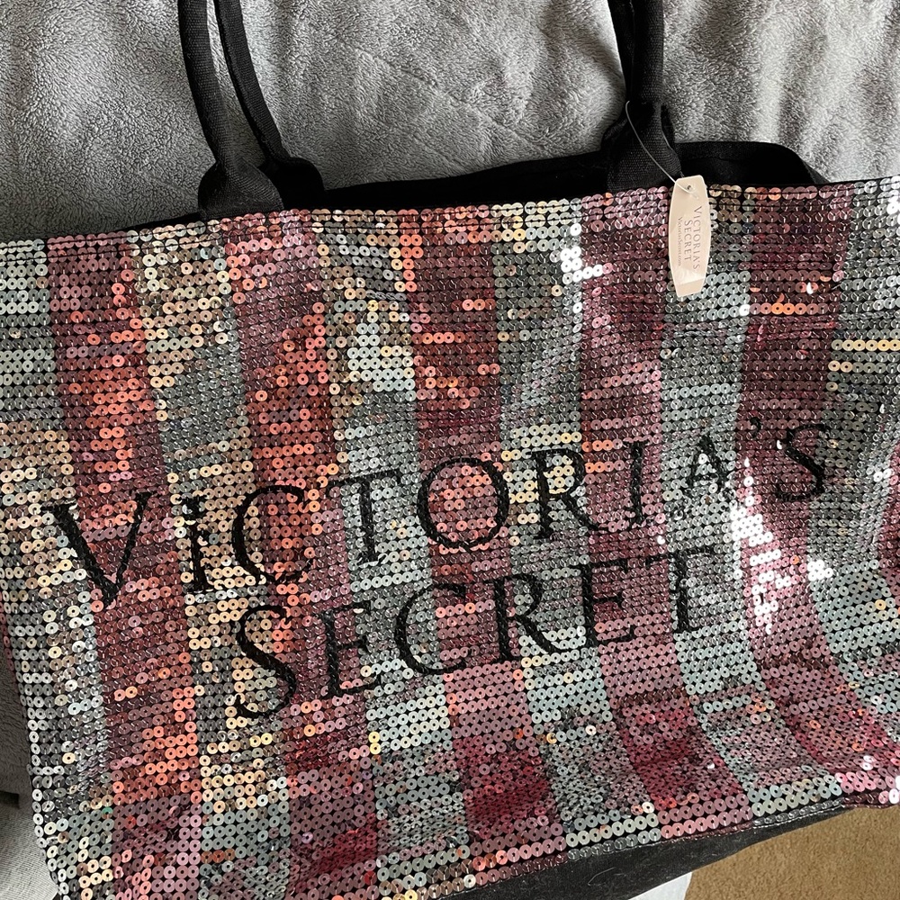 Victoria’s Secret tote bag, pink sequence, still has tags, really large.